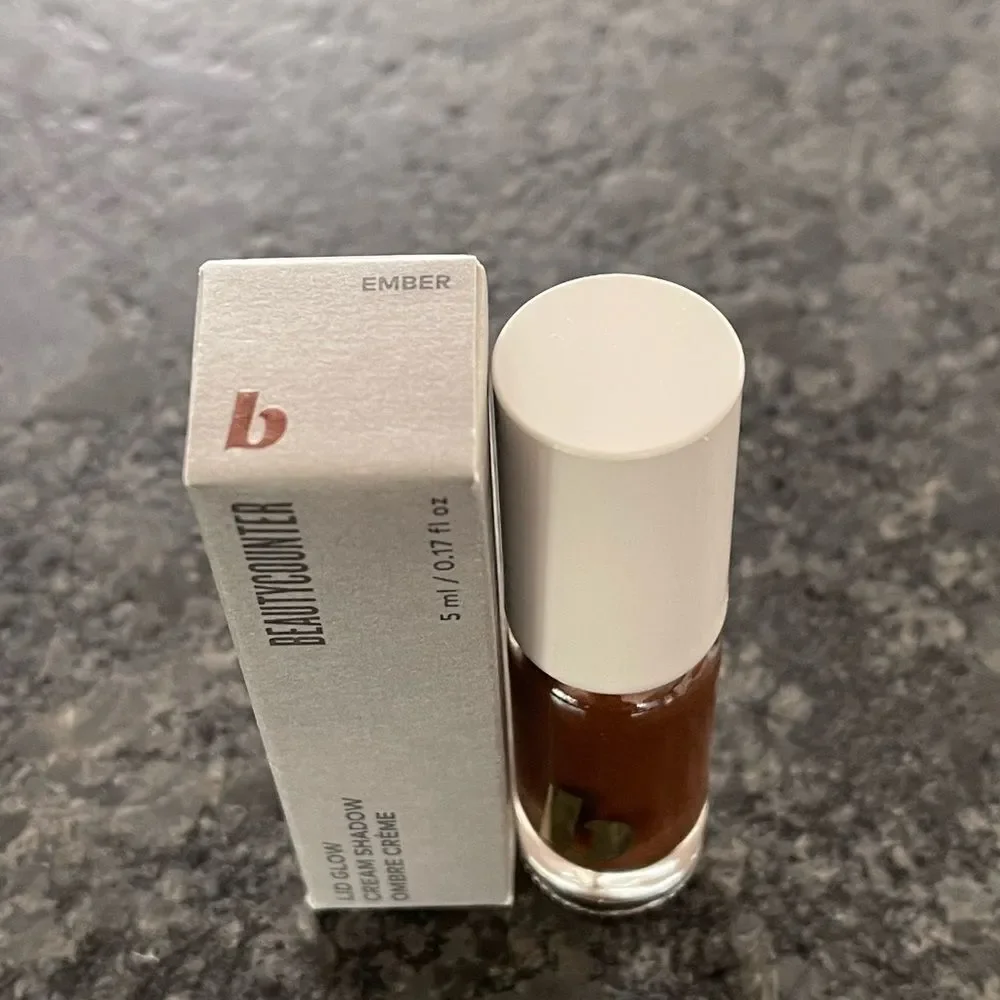 Beautycounter Lid Glow Cream Shadow in Ember, a  shimmering deep bronze BNIB